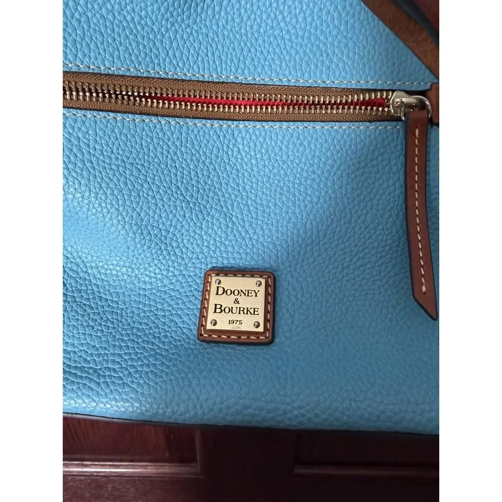 Dooney & Bourke Pebble Grain Drawstring Bucket Bag Blue Leather Red Interior